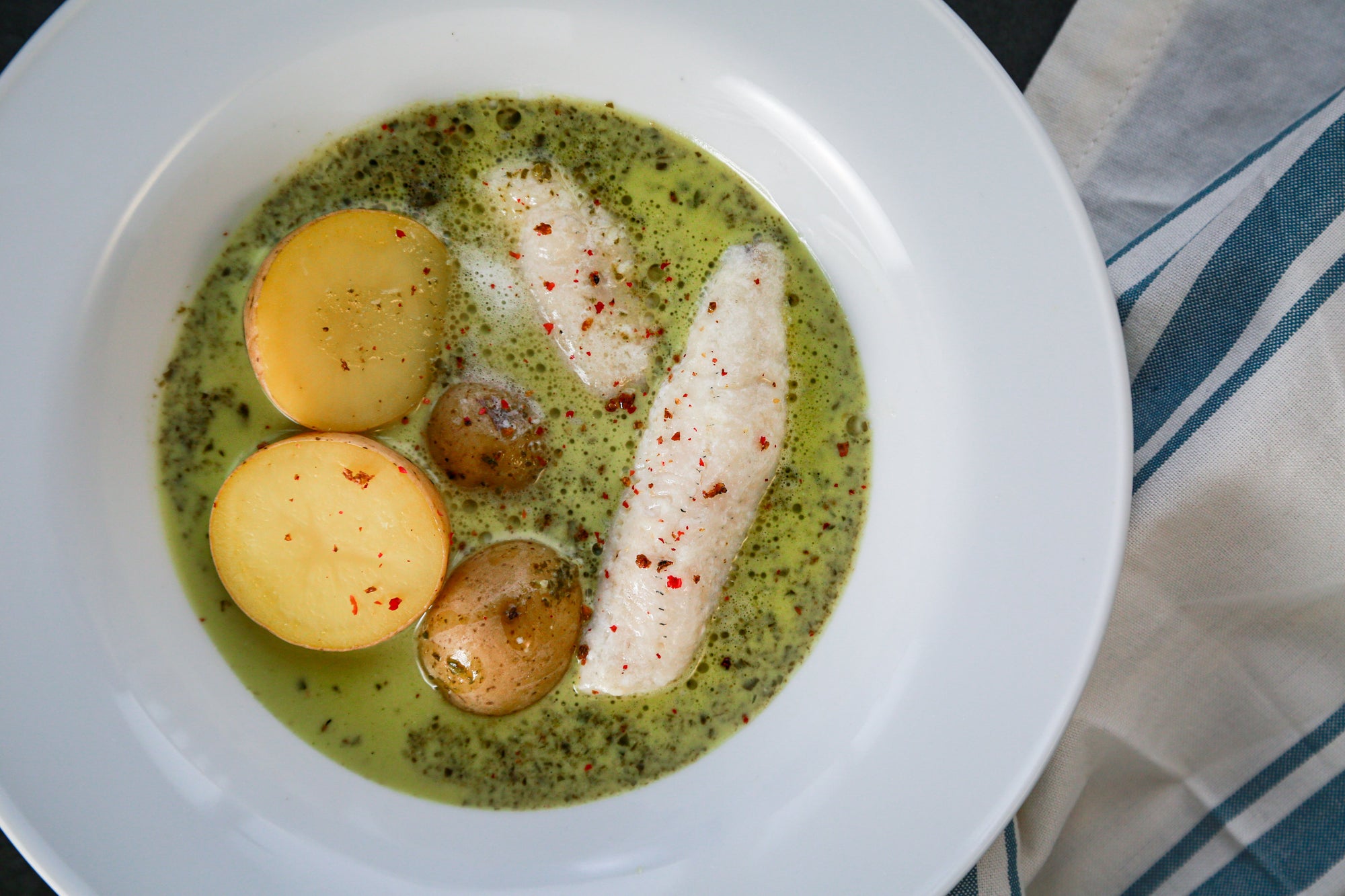 Perch Poached in Butter with Spinach, Lemon and Cream